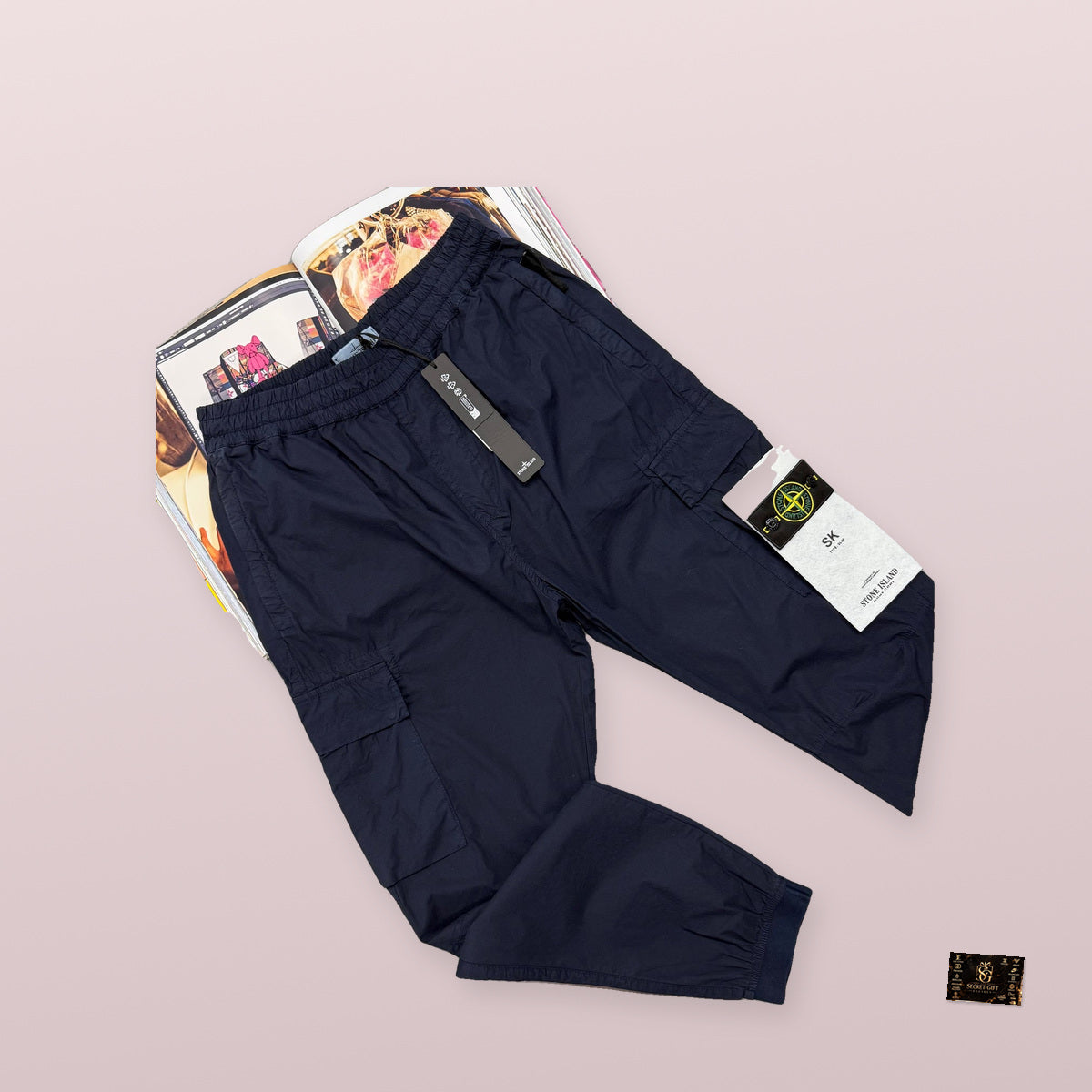 SI CARGO PANTS - NAVY with a realistically scaled Secret Gift Society marble business card
