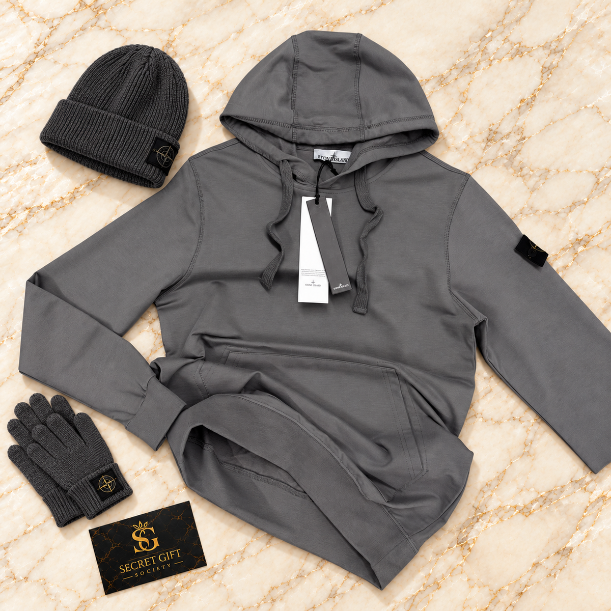 SI HOODIE - CHARCOAL on ivory marble with matching branded beanie and gloves and Secret Gift Society business card