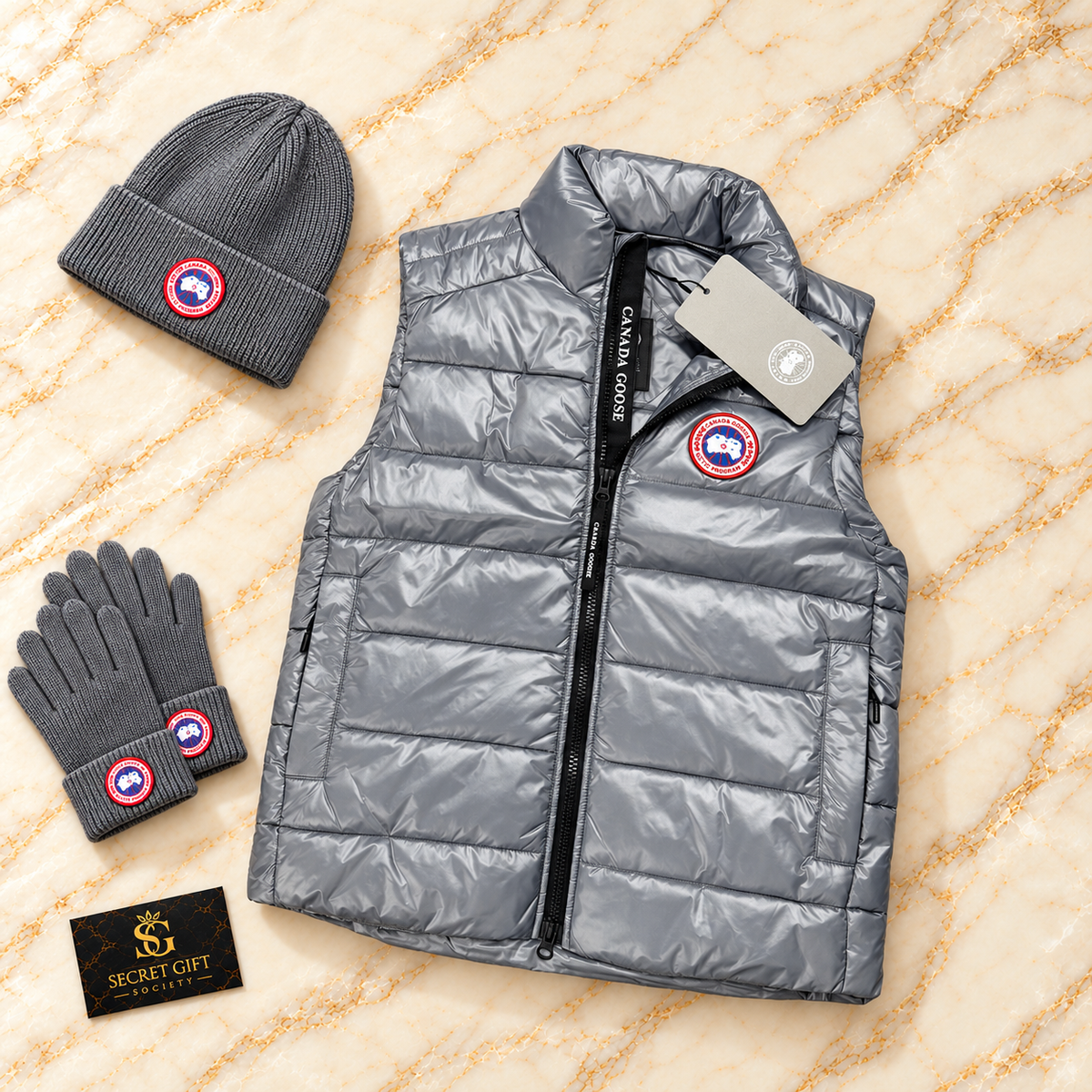 CG CROFTON GILET - GREY with matching branded styling props and Secret Gift Society card