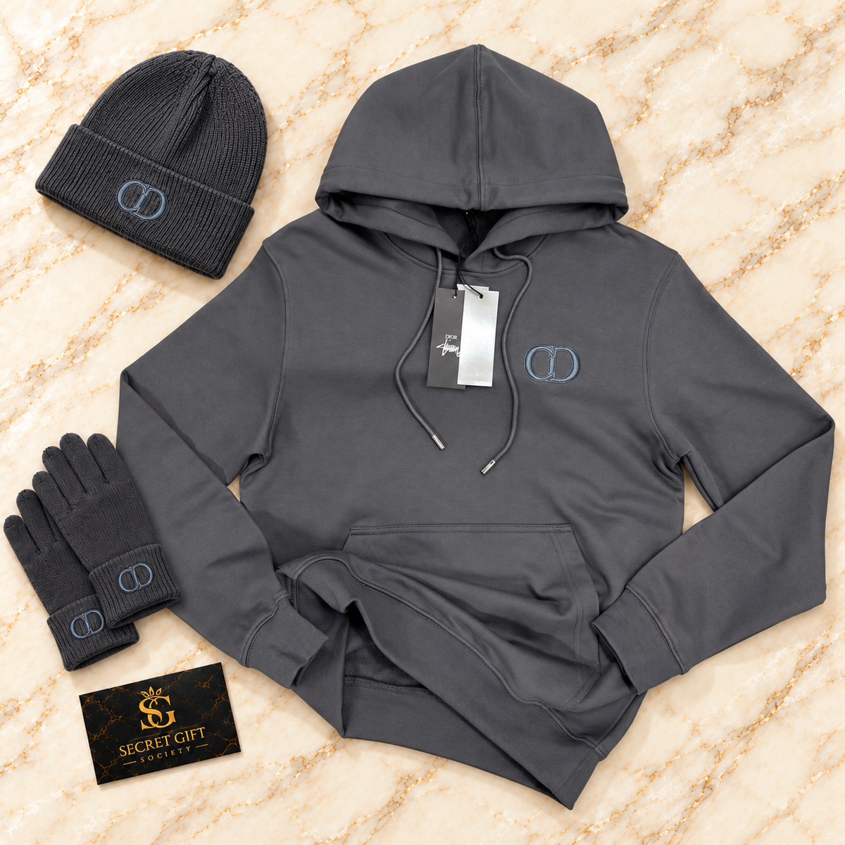 CD HOODIE - CHARCOAL on ivory marble with matching branded beanie and gloves and Secret Gift Society business card