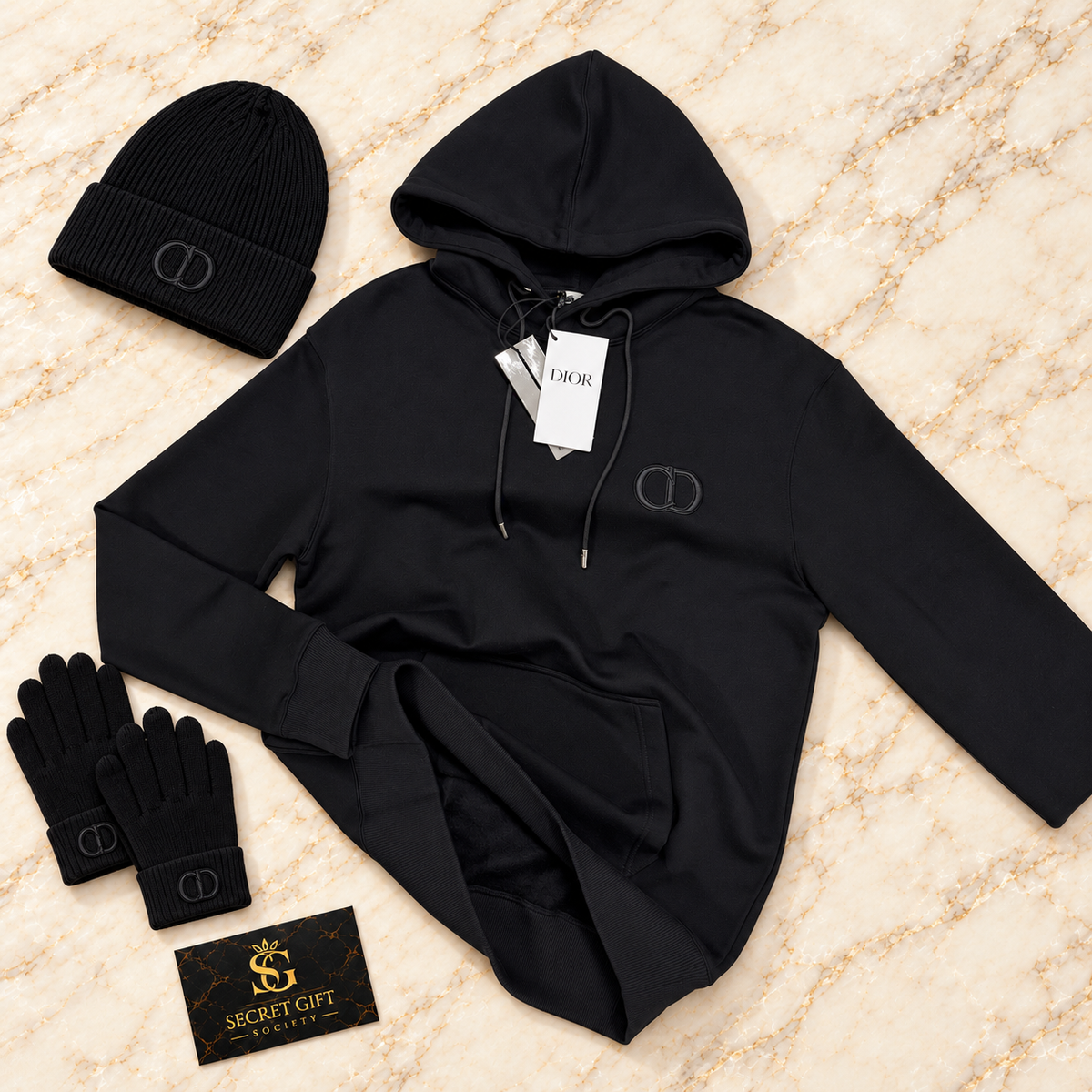 CD HOODIE - BLACK on ivory marble with matching branded beanie and gloves and Secret Gift Society business card