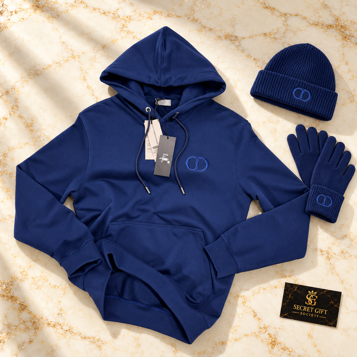 CD HOODIE - NAVY on ivory marble with matching branded beanie and gloves and Secret Gift Society business card