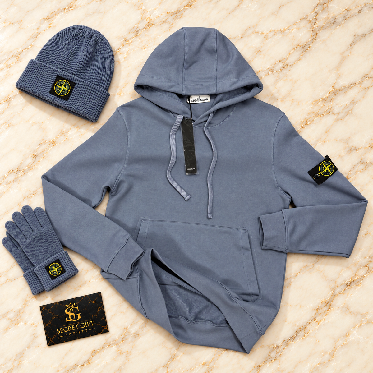 SI HOODIE - PALE BLUE on ivory marble with matching branded beanie and gloves and Secret Gift Society business card