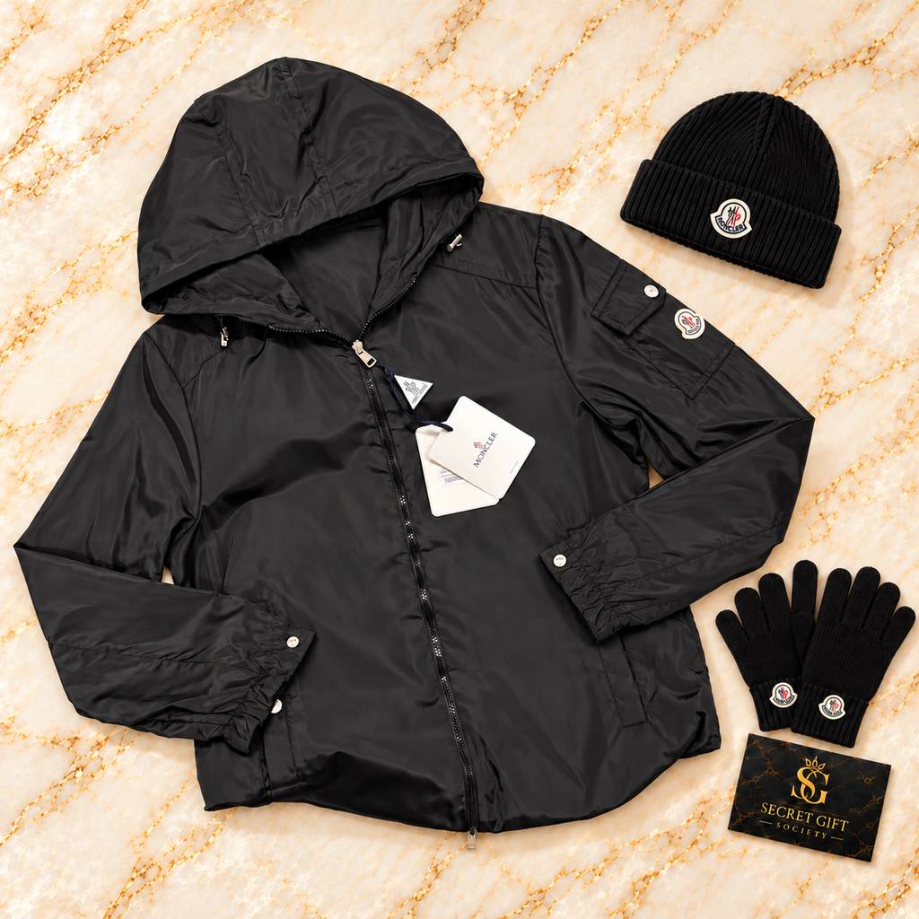 MNCLR ETIACHE HOODED JACKET — black. Styling props not included.