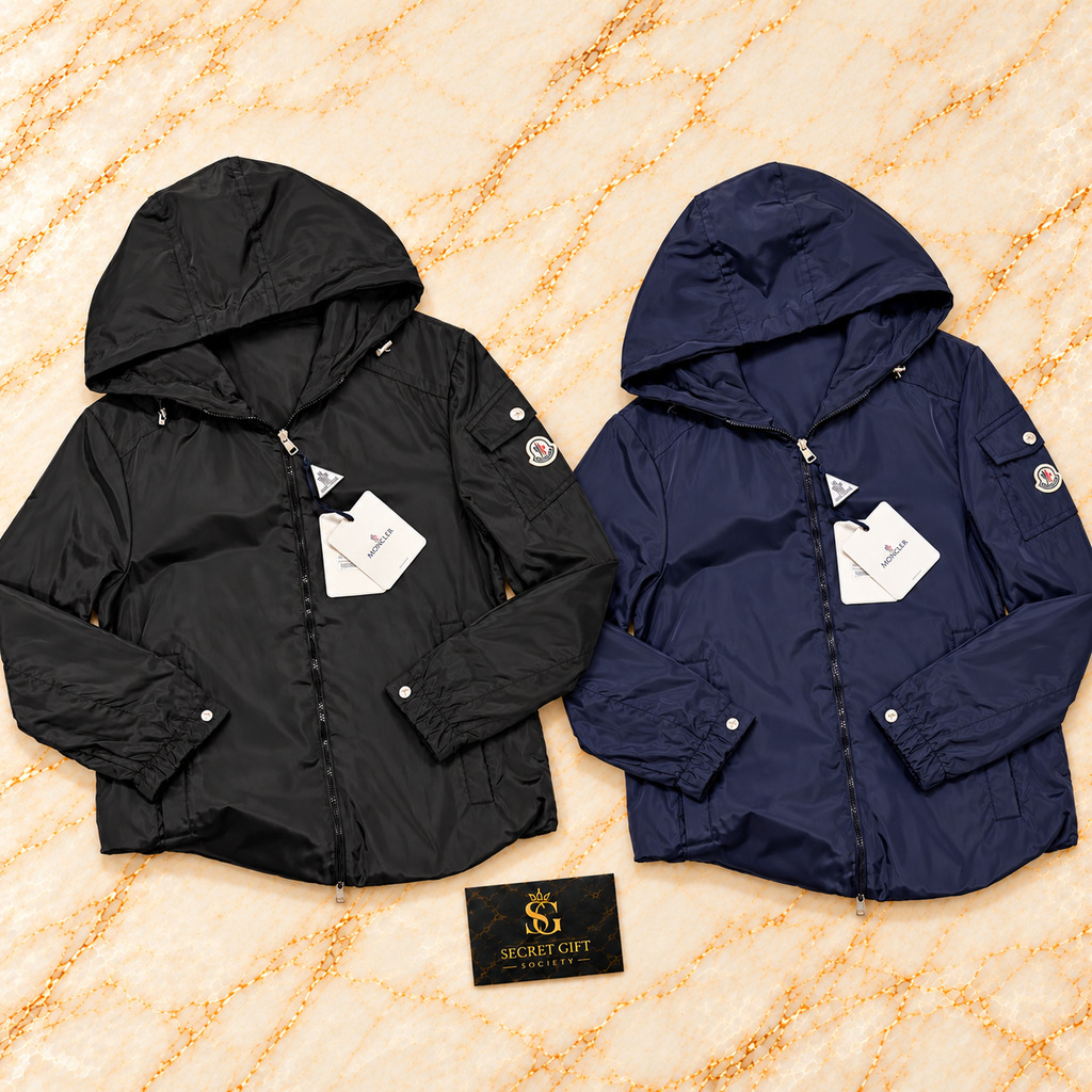 Moncler ETIACHE HOODED JACKET — Black, Navy colour collage. Choose a colour and size; one garment per order. Secret Gift Society card is a styling prop.